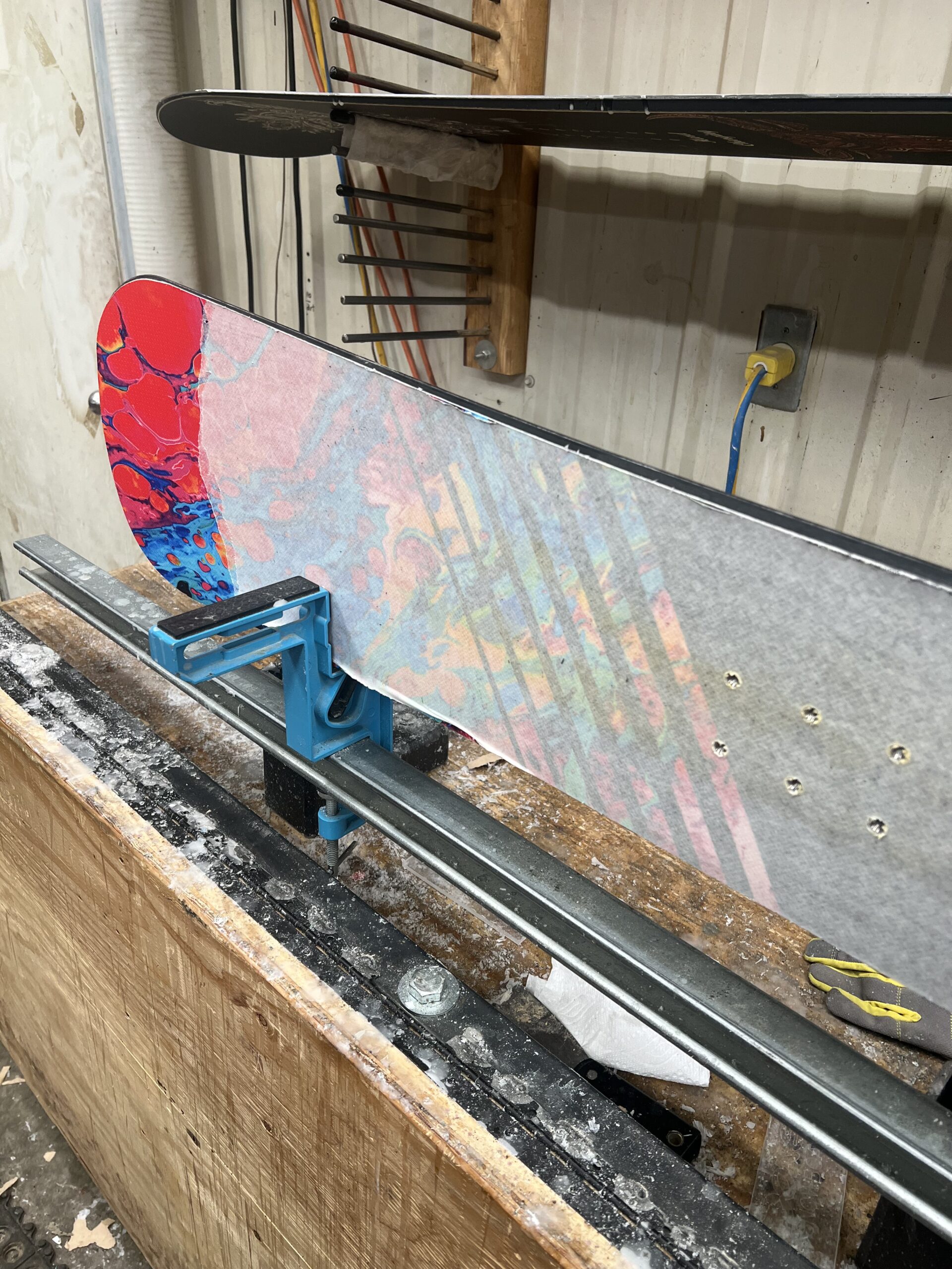 snowboard with tape on it