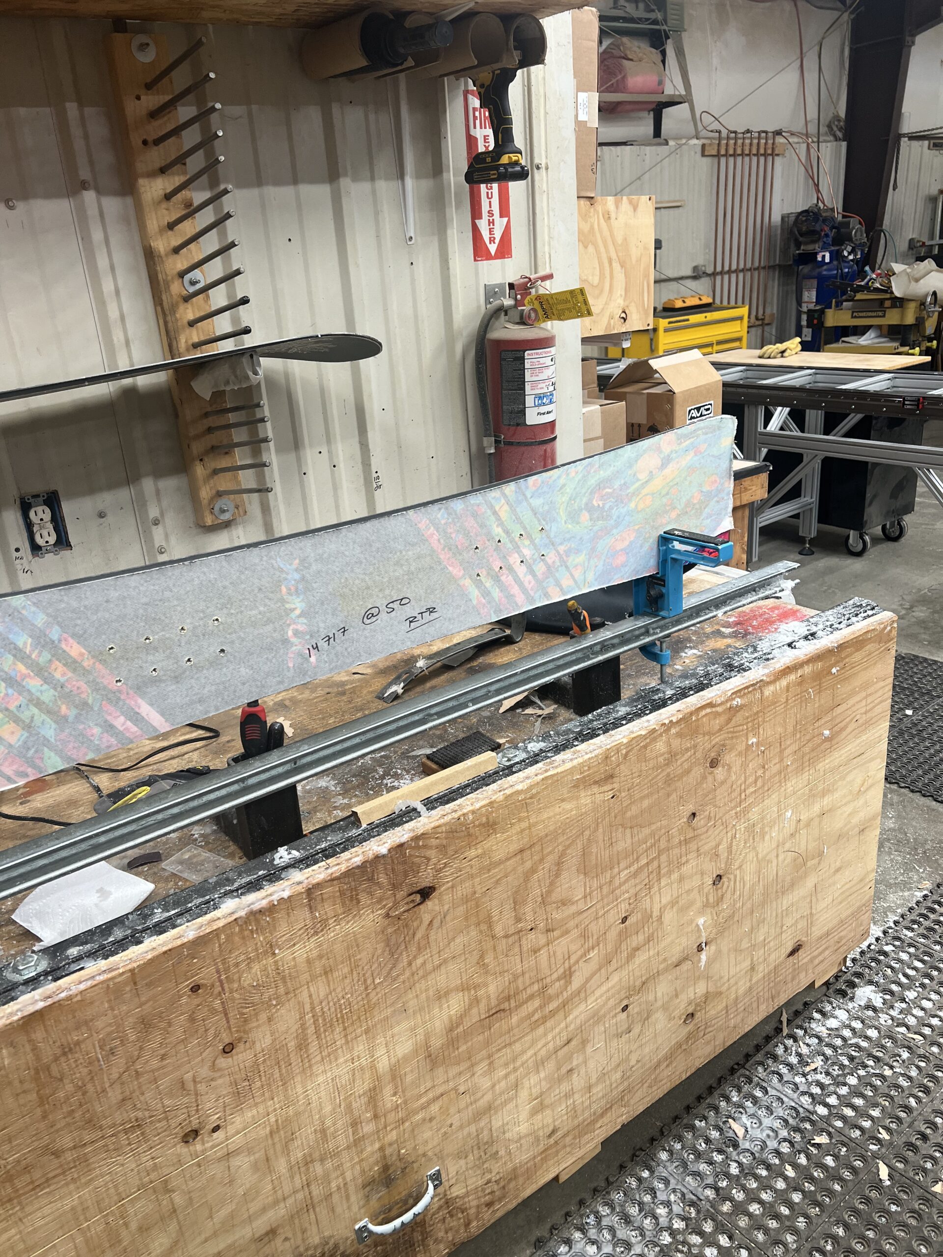 snowboard with tape on it