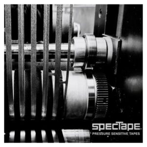 artistic close up of industrial tape being pulled taut on a machine