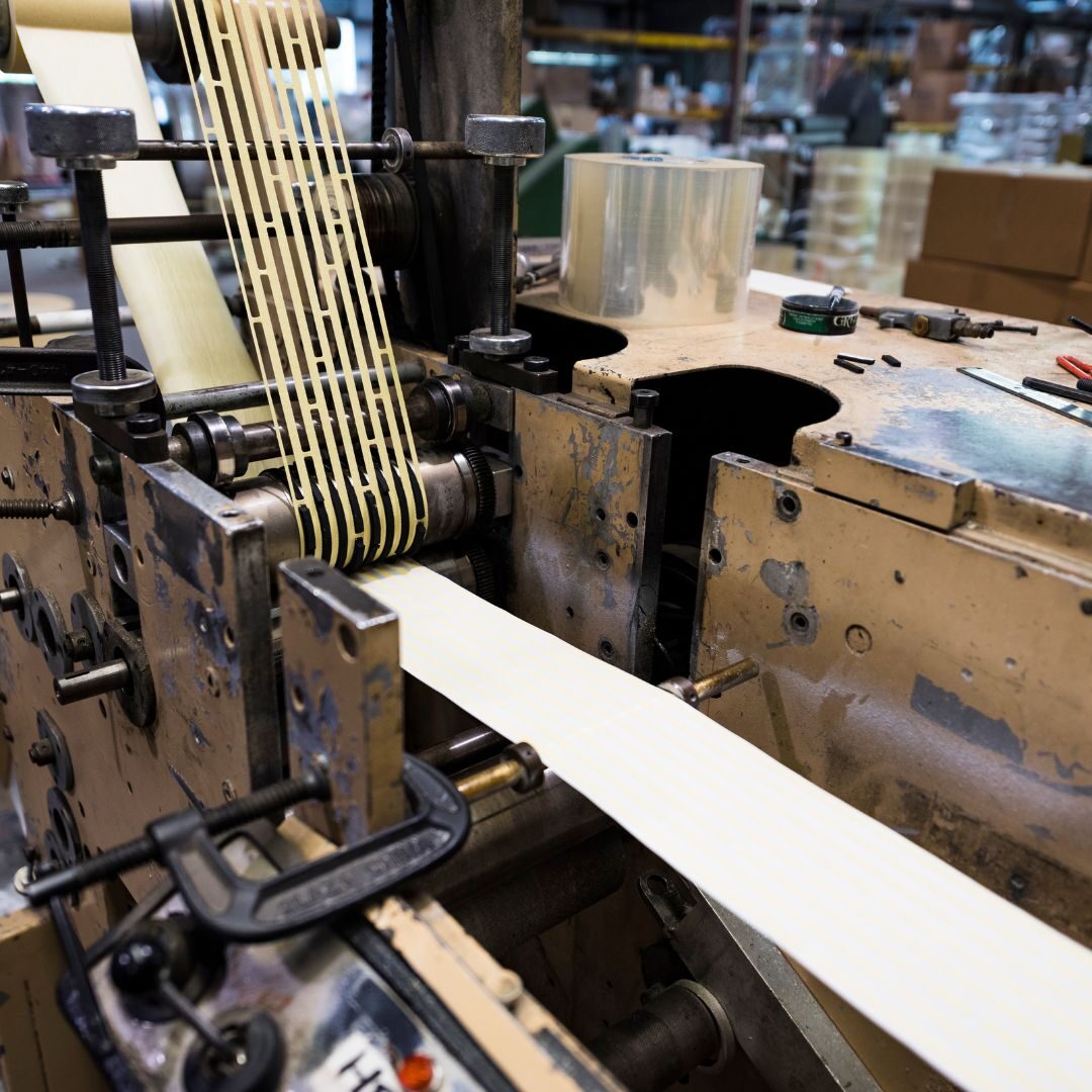 tape going through rollers